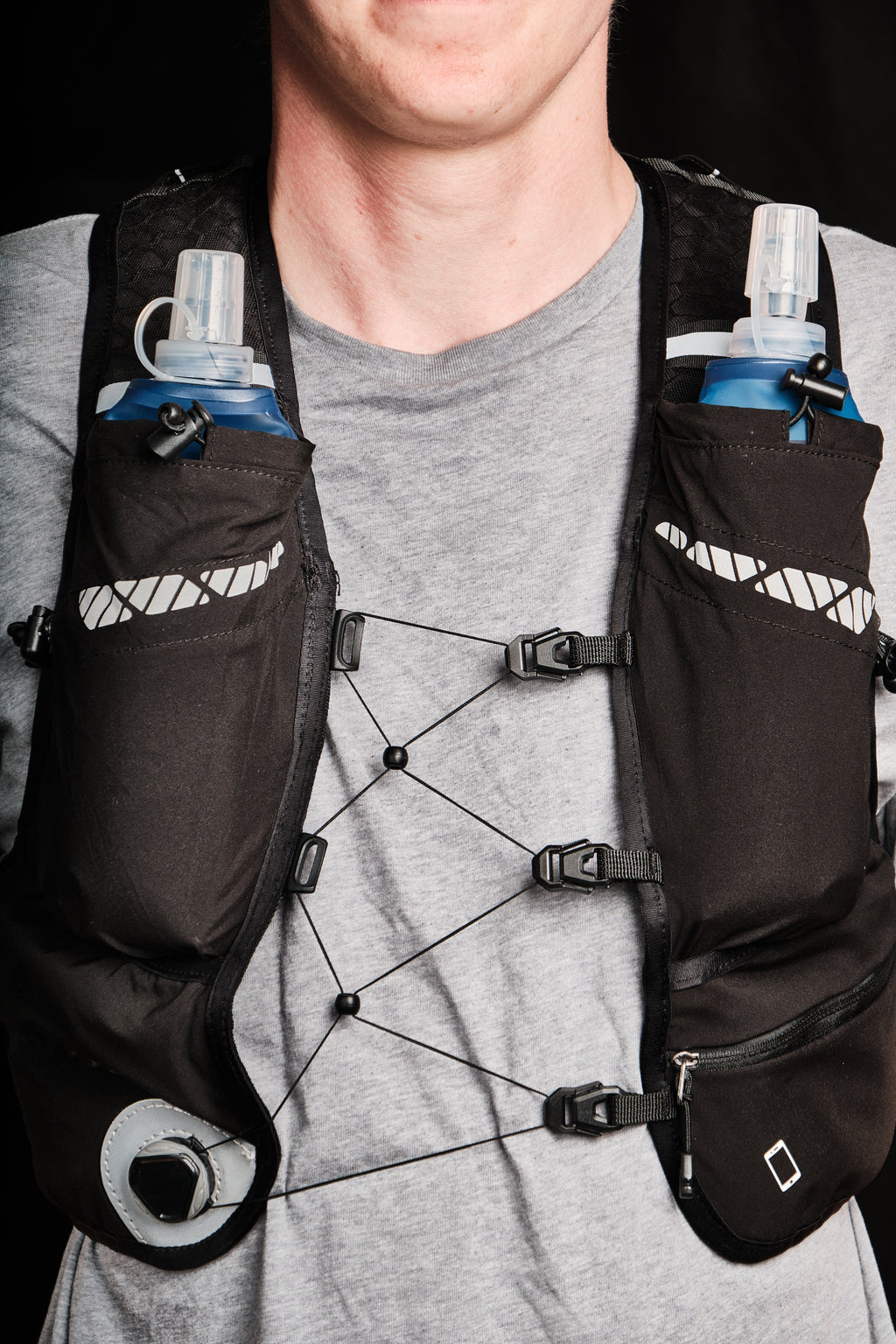 STRYDE Pro worn from the front with two soft flasks
